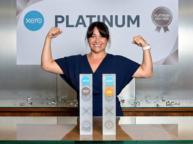 Nikoletta beside the Xero Platinum Partner award