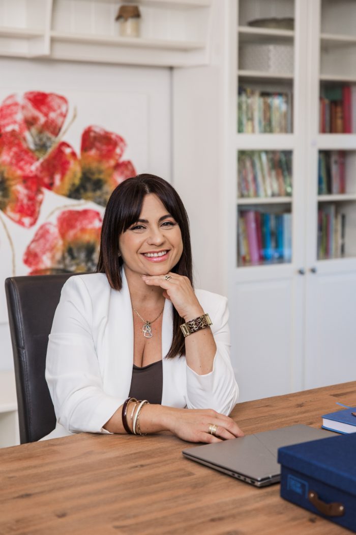 Nikoletta, director of NN Accountability, at her desk in the Gold Coast office