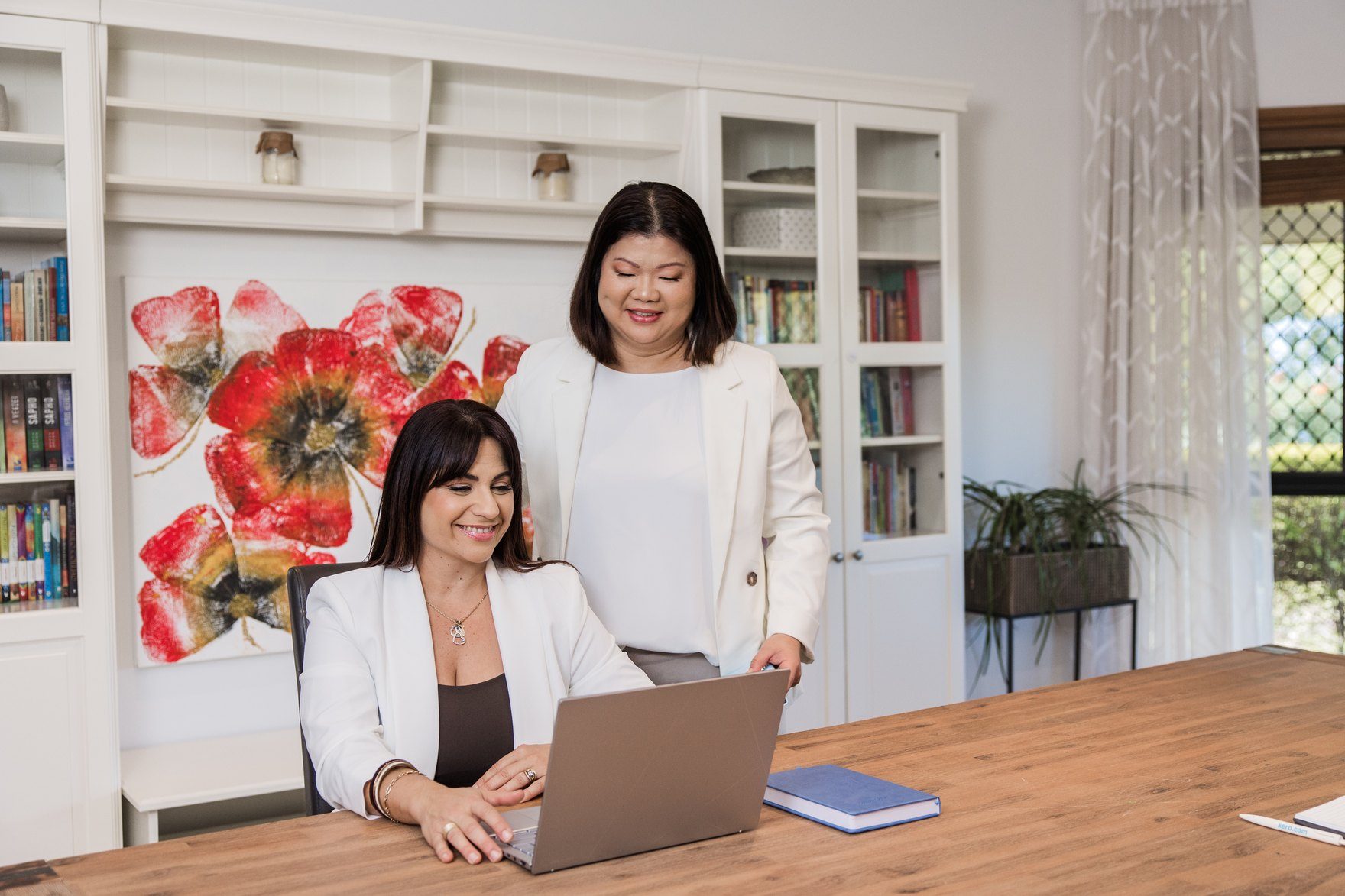 Nikoletta and Joanna of NN Accountability together in the office